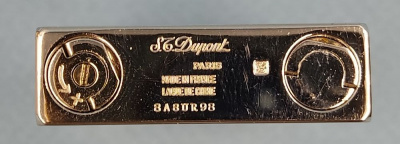 Газовая зажигалка "S.T.Dupont" в родной коробке.